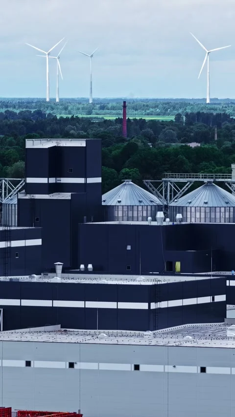 Data Center Facility With Wind Turbines in Background Stock Footage 337387139