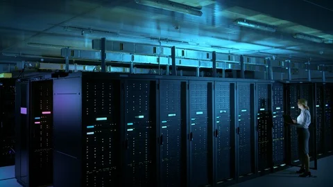 In Data Center: Female IT Technician Running Maintenance Programme on a Laptop Stock Footage 101189162