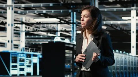Data center female programmer creating digital twin scan to optimize servers Stock-Footage 329326822