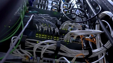 Data center flashing lights. back side of working data servers. router working. Video stock 88182409