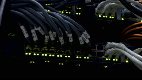 Data center flashing lights. back side of working data servers. Video stock 88182438