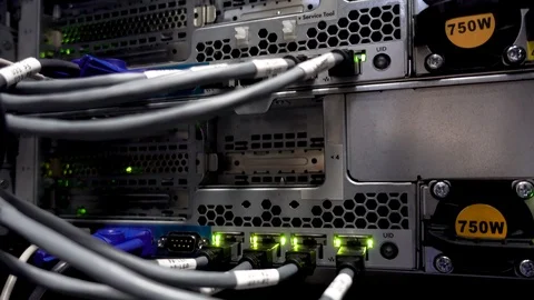 Data center flashing lights. back side of working data servers. Video stock 88489438
