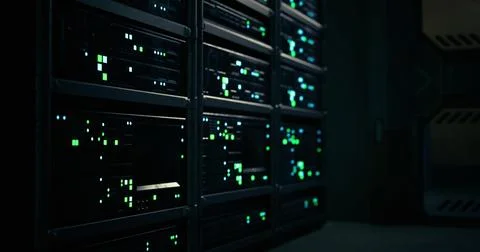 Data center with illuminated server racks at nighttime Stock Illustration