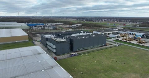 Data center, internet infrastructure, aerial birds eye view drone in Almere Stock Footage 260735641