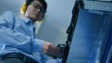 In the Data Center: IT Engineer Installs New HDD Hard Drive and Other Hardware Stock Footage 101183881