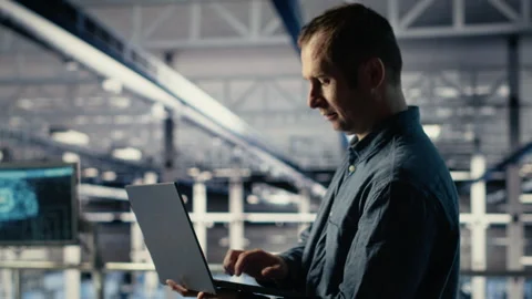 Data center IT professional deploys deep learning software on racks Stock Footage 314685471