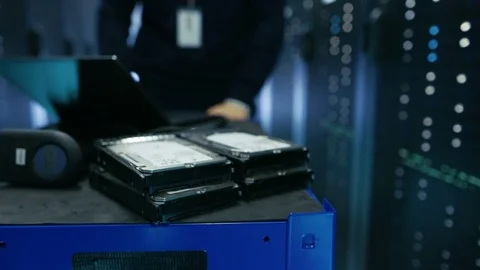 In Data Center IT Technician Pushes Crash Cart With Various Hardware and Laptop  Stock Footage 74630990