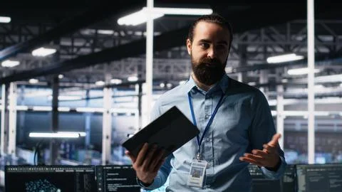 Data center lead programmer showcasing AI technology and rigs Stock Photos