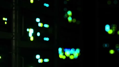 Data center with LED lights at night during technology operations Stock Footage 344998810