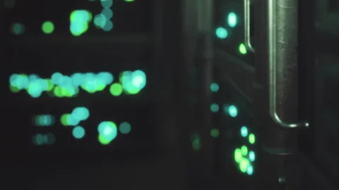 Data center with lights showing activity from servers at night Stock Footage 345006128
