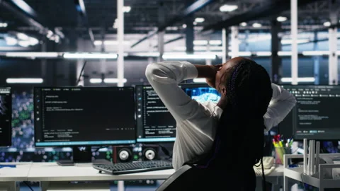 Data center manager checking work done by admins using deep learning Stock Footage 313566309