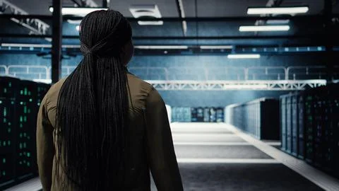 Data center manager conducts security audits to protect against cyber threats Stock Photos