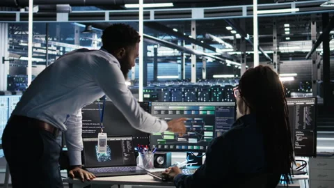 Data center manager supervising engineer using node tree tool Stock Footage 307018798