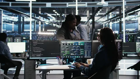 Data center manager supervising technician using node tree software Stock Footage 307042621
