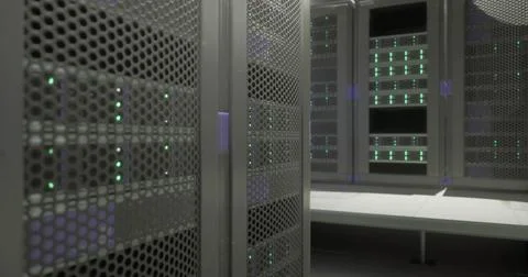 Data center with multiple server racks illuminated by green lights Stock Illustration