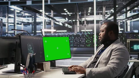 Data center programmer coding on green screen PC, monitoring AI systems Stock Footage 309791118