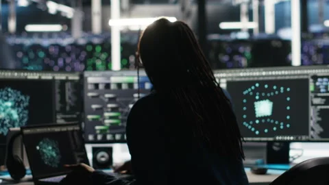 Data center programmer entering office uses node tree program Stock Footage 307031799