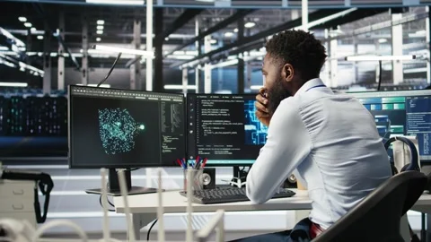 Data center programmer uses neural networks node tree program to identify issues Stock Footage 309119498