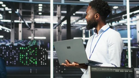Data center programmer uses node tree software to identify equipment issues Stock Footage 309118815