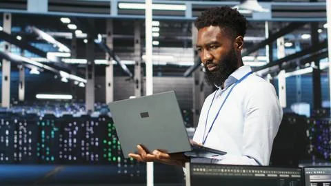 Data center programmer uses node tree software to identify equipment issues Stock Photos