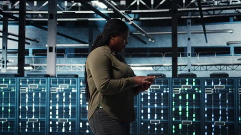Data center programmer uses tablet to develop disaster recovery plans Stock-Footage 317206352