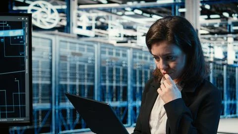 Data center programmer using augmented reality tech to conduct security audit Stock Photos