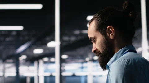 Data center programmer using laptop to monitor neural network using AI chatbot Stock-Footage 313635252