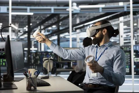 Data center programmer using virtual reality to setup machine learning systems Stock Photos