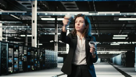 Data center programmer using VR equipment to create digital twin scan of rigs Stock Footage 329333946