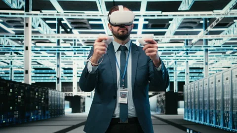 Data center programmer using VR headset tech to do equipment optimization Video stock 329651972