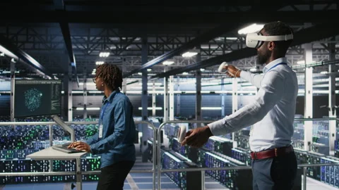 Data center programmers on industrial platform using virtual reality tech Stock Footage 310787482
