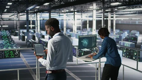 Data center programmers on industrial platform checking lines of code Video stock 310789087