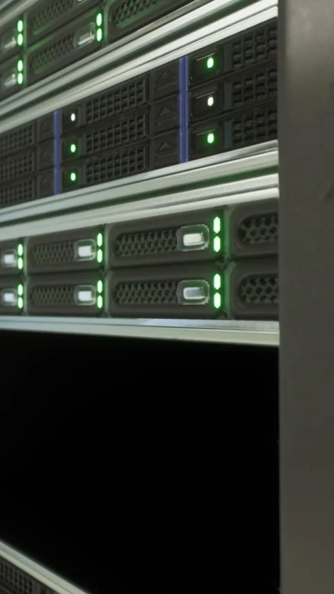 Data center racks with server lights glowing during business hours Stock Footage 337924972