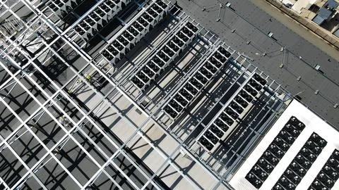 Data center rooftop construction installing cooling systems Stock Photos