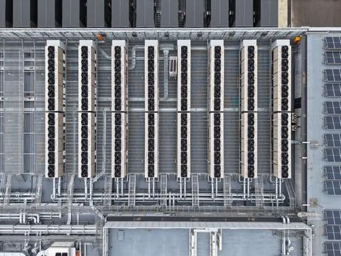 Data center rooftop cooling systems and solar panels Stock Photos
