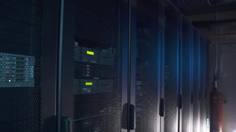 Data center with rows of servers cabinets on multiple racks Stock Footage 163814435