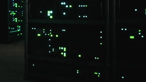 Data center with server racks displaying green lights at night Stock Footage 342807235