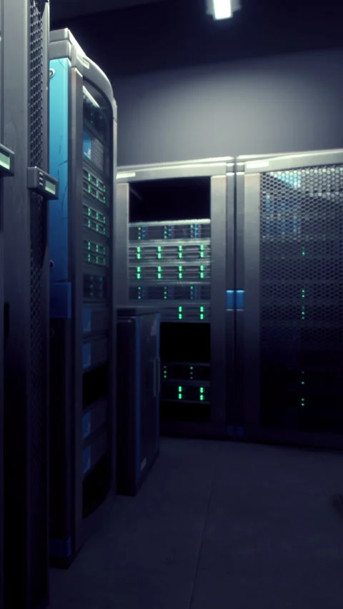 Data center with server racks illuminated in a dim space during the night Stock Footage 337925028