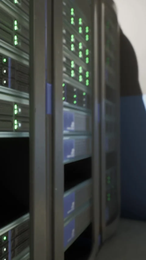 Data center with server racks showing lights and equipment in use Stock Footage 337924982