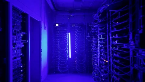 Data center server room with changing red and blue neon lighting atmosphere. Stock Footage 339643803