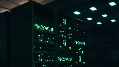 Data center with servers and lights at night in a working facility Stock Footage 344998669
