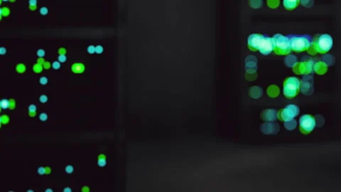 Data center with servers and lights showing network activity at night Stock Footage 345006084