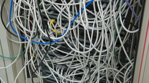 Data Center Servers Switchboard panel with chaotic mess cables  tilt up Stock-Footage 102150681