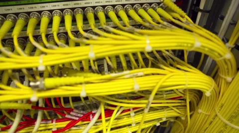 Data Center Servers With Yellow Cable Upload And Download Server  - Pan Left Видео 58944880