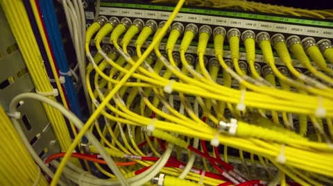 Data Center Servers With Yellow Cable Upload And Download Server  - Pan Right Видео 58945346
