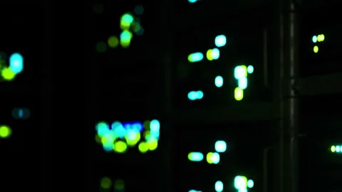 Data center shows lights from server racks in night setting Stock Footage 345007454