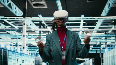 Data center smiling programmer uses VR headset technology Stock Footage 329591908