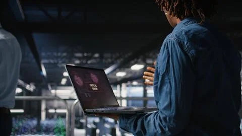 Data center software developer panicking after receiving critical error Stock Photos