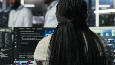 Data center software developer using artificial intelligence deep learning model Stock Footage 308043294