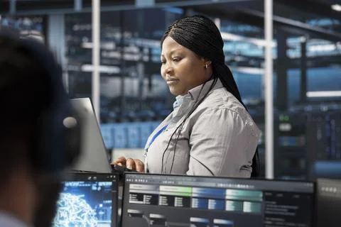 Data center software developer using artificial intelligence neural networks Stock Photos